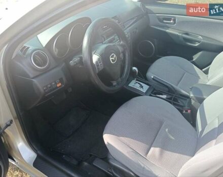 Желтый Мазда 3, объемом двигателя 1.6 л и пробегом 230 тыс. км за 4700 $, фото 3 на Automoto.ua