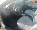Желтый Мазда 3, объемом двигателя 1.6 л и пробегом 230 тыс. км за 4700 $, фото 3 на Automoto.ua