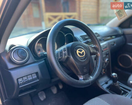 Мазда 3 2007 в Жовкве на Automoto.ua Желтый Мазда 3, объемом двигателя 1.6 л и пробегом 352 тыс. км за 3450 $, фото 13 на Automoto.ua
