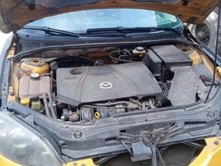 Жовтий Мазда 3, об'ємом двигуна 2 л та пробігом 330 тис. км за 2800 $, фото 1 на Automoto.ua