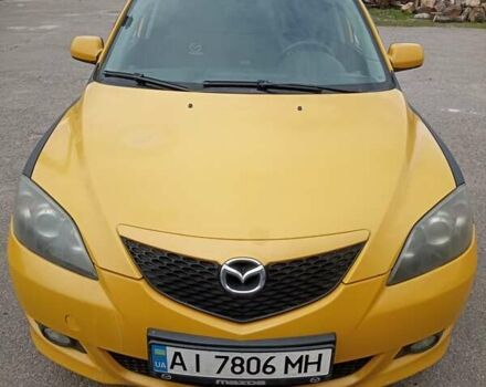 Жовтий Мазда 3, об'ємом двигуна 2 л та пробігом 330 тис. км за 2800 $, фото 1 на Automoto.ua