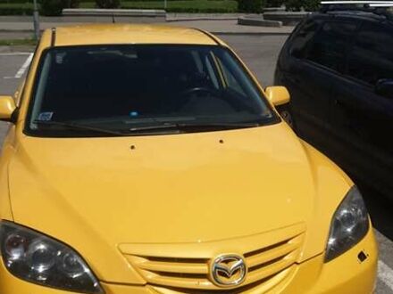 Желтый Мазда 3, объемом двигателя 2 л и пробегом 270 тыс. км за 4000 $, фото 1 на Automoto.ua