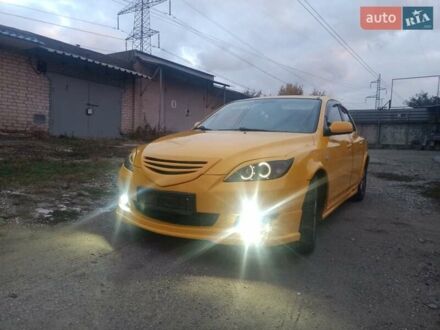 Желтый Мазда 3, объемом двигателя 1.6 л и пробегом 205 тыс. км за 5550 $, фото 1 на Automoto.ua