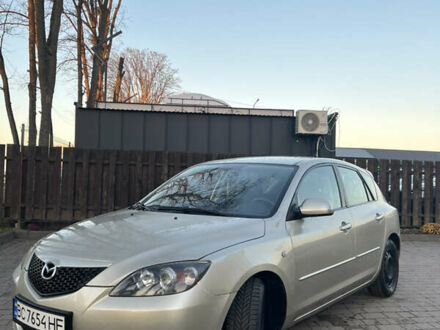 Желтый Мазда 3, объемом двигателя 1.56 л и пробегом 190 тыс. км за 3399 $, фото 1 на Automoto.ua