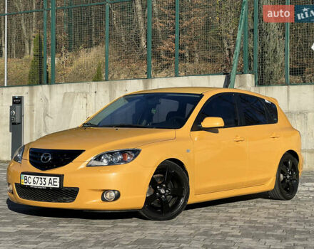 Желтый Мазда 3, объемом двигателя 2 л и пробегом 195 тыс. км за 6400 $, фото 1 на Automoto.ua