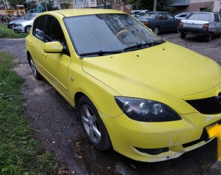 Желтый Мазда 3, объемом двигателя 2 л и пробегом 254 тыс. км за 4200 $, фото 1 на Automoto.ua