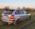 Сірий Мазда 3, об'ємом двигуна 2 л та пробігом 250 тис. км за 602 $, фото 3 на Automoto.ua