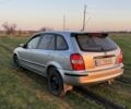 Сірий Мазда 3, об'ємом двигуна 2 л та пробігом 250 тис. км за 602 $, фото 4 на Automoto.ua