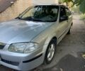 Сірий Мазда 3, об'ємом двигуна 1.5 л та пробігом 270 тис. км за 2000 $, фото 4 на Automoto.ua