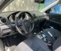 Серый Мазда 3, объемом двигателя 1.6 л и пробегом 130 тыс. км за 4999 $, фото 6 на Automoto.ua