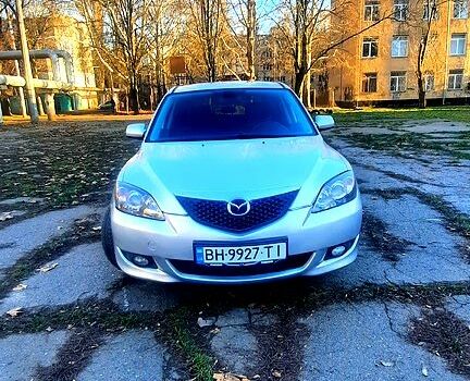 Серый Мазда 3, объемом двигателя 2 л и пробегом 230 тыс. км за 4700 $, фото 1 на Automoto.ua