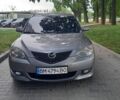 Серый Мазда 3, объемом двигателя 1.6 л и пробегом 252 тыс. км за 2899 $, фото 1 на Automoto.ua