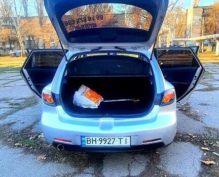 Серый Мазда 3, объемом двигателя 2 л и пробегом 230 тыс. км за 4700 $, фото 3 на Automoto.ua