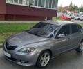 Серый Мазда 3, объемом двигателя 1.6 л и пробегом 252 тыс. км за 2899 $, фото 1 на Automoto.ua