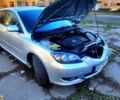 Серый Мазда 3, объемом двигателя 2 л и пробегом 230 тыс. км за 4700 $, фото 1 на Automoto.ua