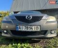 Серый Мазда 3, объемом двигателя 1.6 л и пробегом 239 тыс. км за 3999 $, фото 1 на Automoto.ua