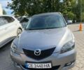 Серый Мазда 3, объемом двигателя 1.6 л и пробегом 313 тыс. км за 3769 $, фото 1 на Automoto.ua