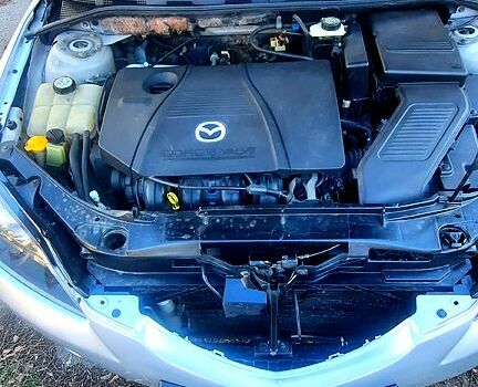 Серый Мазда 3, объемом двигателя 2 л и пробегом 230 тыс. км за 4700 $, фото 2 на Automoto.ua