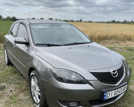 Серый Мазда 3, объемом двигателя 1.6 л и пробегом 260 тыс. км за 3800 $, фото 1 на Automoto.ua