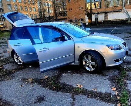 Серый Мазда 3, объемом двигателя 2 л и пробегом 230 тыс. км за 4700 $, фото 7 на Automoto.ua