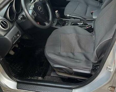 Серый Мазда 3, объемом двигателя 2 л и пробегом 212 тыс. км за 4500 $, фото 3 на Automoto.ua