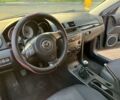 Сірий Мазда 3, об'ємом двигуна 1.8 л та пробігом 208 тис. км за 1000 $, фото 5 на Automoto.ua