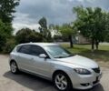 Сірий Мазда 3, об'ємом двигуна 1.6 л та пробігом 295 тис. км за 4550 $, фото 3 на Automoto.ua