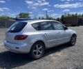 Серый Мазда 3, объемом двигателя 1.6 л и пробегом 302 тыс. км за 1999 $, фото 1 на Automoto.ua