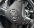 Сірий Мазда 3, об'ємом двигуна 1.4 л та пробігом 240 тис. км за 3999 $, фото 3 на Automoto.ua