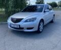 Сірий Мазда 3, об'ємом двигуна 2 л та пробігом 200 тис. км за 3300 $, фото 1 на Automoto.ua