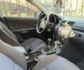 Сірий Мазда 3, об'ємом двигуна 1.6 л та пробігом 307 тис. км за 3495 $, фото 4 на Automoto.ua