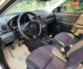 Сірий Мазда 3, об'ємом двигуна 1.6 л та пробігом 289 тис. км за 4300 $, фото 16 на Automoto.ua