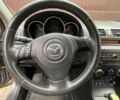 Серый Мазда 3, объемом двигателя 1.6 л и пробегом 346 тыс. км за 2999 $, фото 6 на Automoto.ua
