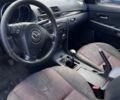 Серый Мазда 3, объемом двигателя 1.6 л и пробегом 302 тыс. км за 1999 $, фото 5 на Automoto.ua
