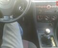 Сірий Мазда 3, об'ємом двигуна 1.4 л та пробігом 240 тис. км за 3999 $, фото 1 на Automoto.ua