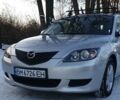 Серый Мазда 3, объемом двигателя 1.6 л и пробегом 171 тыс. км за 5500 $, фото 1 на Automoto.ua