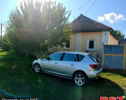 Серый Мазда 3, объемом двигателя 2 л и пробегом 302 тыс. км за 4500 $, фото 1 на Automoto.ua