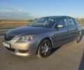 Серый Мазда 3, объемом двигателя 1.6 л и пробегом 300 тыс. км за 3309 $, фото 1 на Automoto.ua