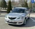 Серый Мазда 3, объемом двигателя 1.6 л и пробегом 180 тыс. км за 4600 $, фото 1 на Automoto.ua