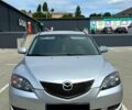 Серый Мазда 3, объемом двигателя 2 л и пробегом 280 тыс. км за 3300 $, фото 1 на Automoto.ua