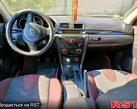 Серый Мазда 3, объемом двигателя 2 л и пробегом 255 тыс. км за 3500 $, фото 1 на Automoto.ua