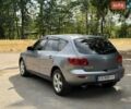 Серый Мазда 3, объемом двигателя 1.6 л и пробегом 255 тыс. км за 3550 $, фото 6 на Automoto.ua