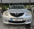 Серый Мазда 3, объемом двигателя 1.56 л и пробегом 170 тыс. км за 4800 $, фото 1 на Automoto.ua