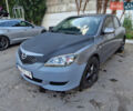 Серый Мазда 3, объемом двигателя 1.6 л и пробегом 285 тыс. км за 4600 $, фото 1 на Automoto.ua