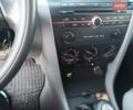 Сірий Мазда 3, об'ємом двигуна 1.4 л та пробігом 214 тис. км за 4299 $, фото 7 на Automoto.ua
