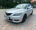 Серый Мазда 3, объемом двигателя 2 л и пробегом 257 тыс. км за 3600 $, фото 1 на Automoto.ua