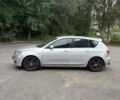 Серый Мазда 3, объемом двигателя 1.6 л и пробегом 295 тыс. км за 2999 $, фото 1 на Automoto.ua