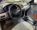 Серый Мазда 3, объемом двигателя 1.3 л и пробегом 193 тыс. км за 3100 $, фото 2 на Automoto.ua