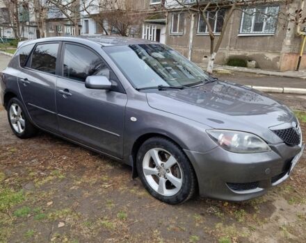 Серый Мазда 3, объемом двигателя 2 л и пробегом 203 тыс. км за 5200 $, фото 2 на Automoto.ua