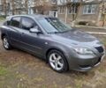Серый Мазда 3, объемом двигателя 2 л и пробегом 203 тыс. км за 5200 $, фото 2 на Automoto.ua